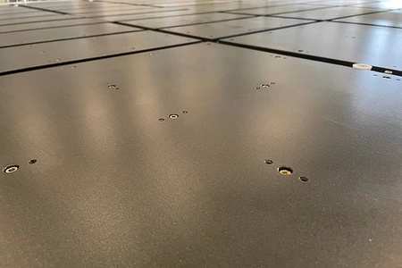 Panneau composite à faible friction